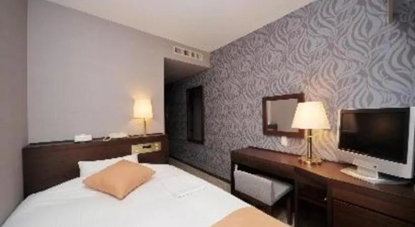 Bed in Welcome Hotel Kochi