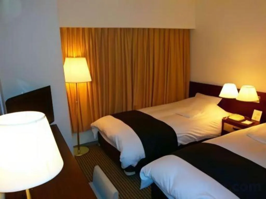 Bed in Welcome Hotel Kochi