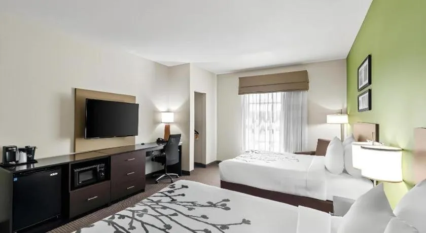 Bed in Sleep Inn & Suites Dripping Springs - Austin Area