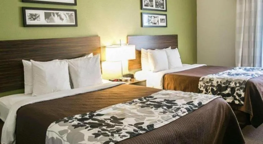 Bed in Sleep Inn & Suites Dripping Springs - Austin Area