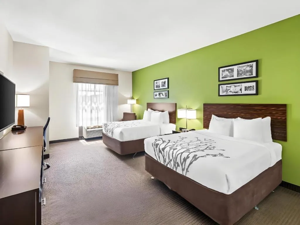 Bed in Sleep Inn & Suites Dripping Springs - Austin Area