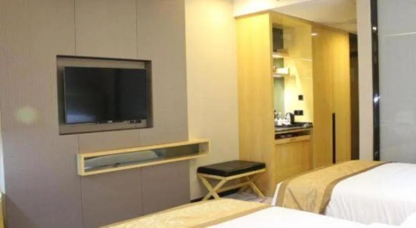 Bed in Golden Phoenix International Hotel