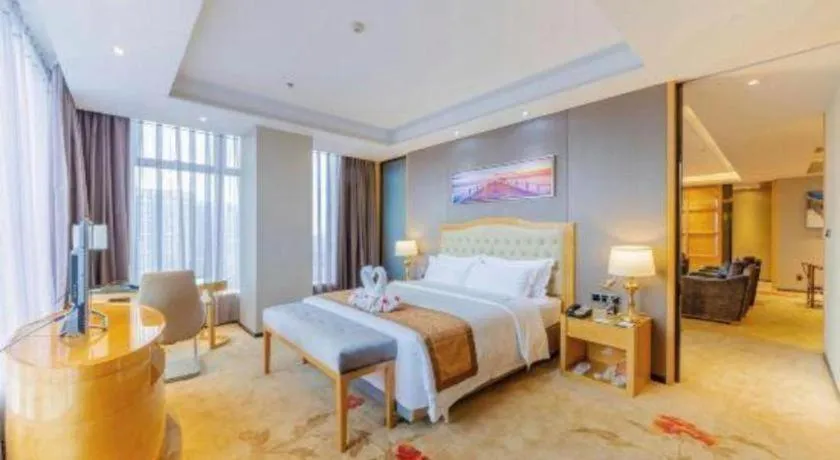 Bed in Golden Phoenix International Hotel