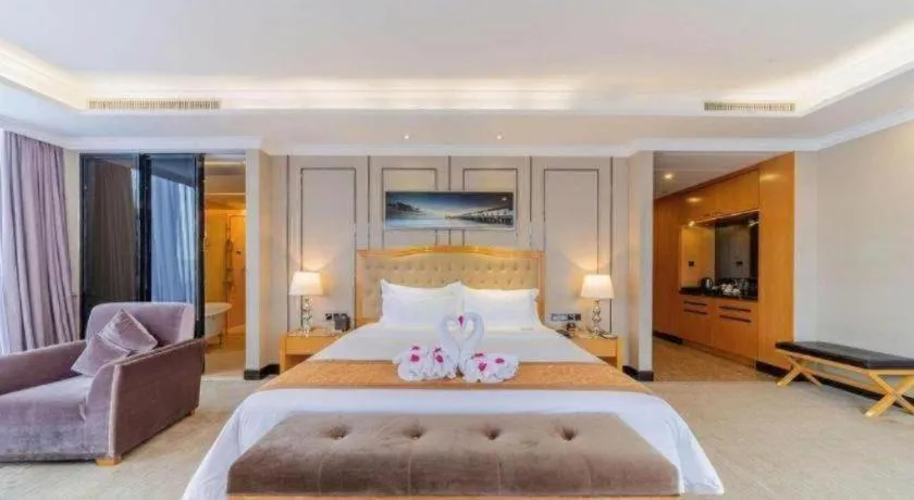 Bed in Golden Phoenix International Hotel