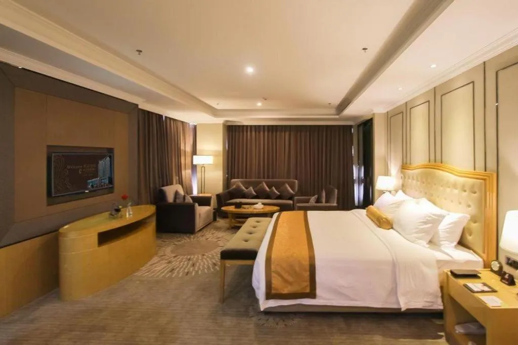 Bed in Golden Phoenix International Hotel