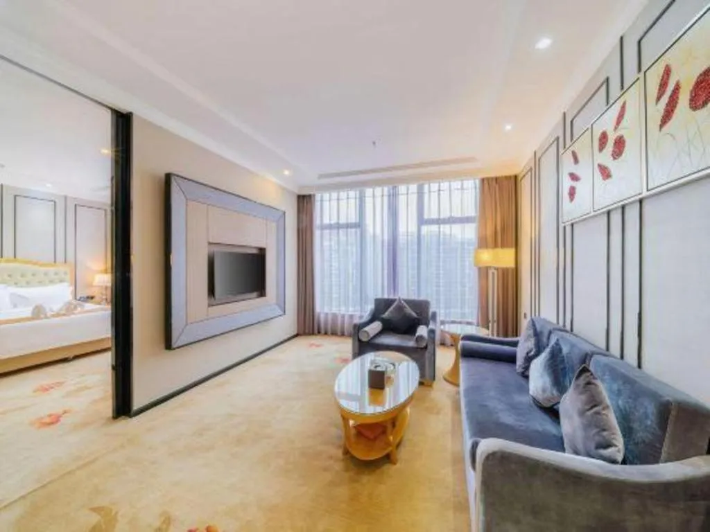 Bed in Golden Phoenix International Hotel