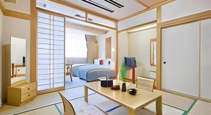 Bed in Hotel Hikyounoyu