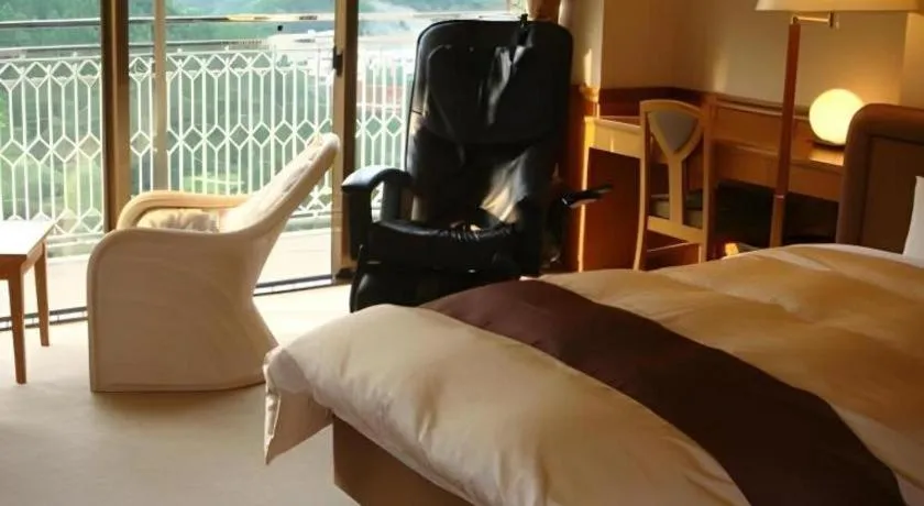 Bed in Hotel Hikyounoyu