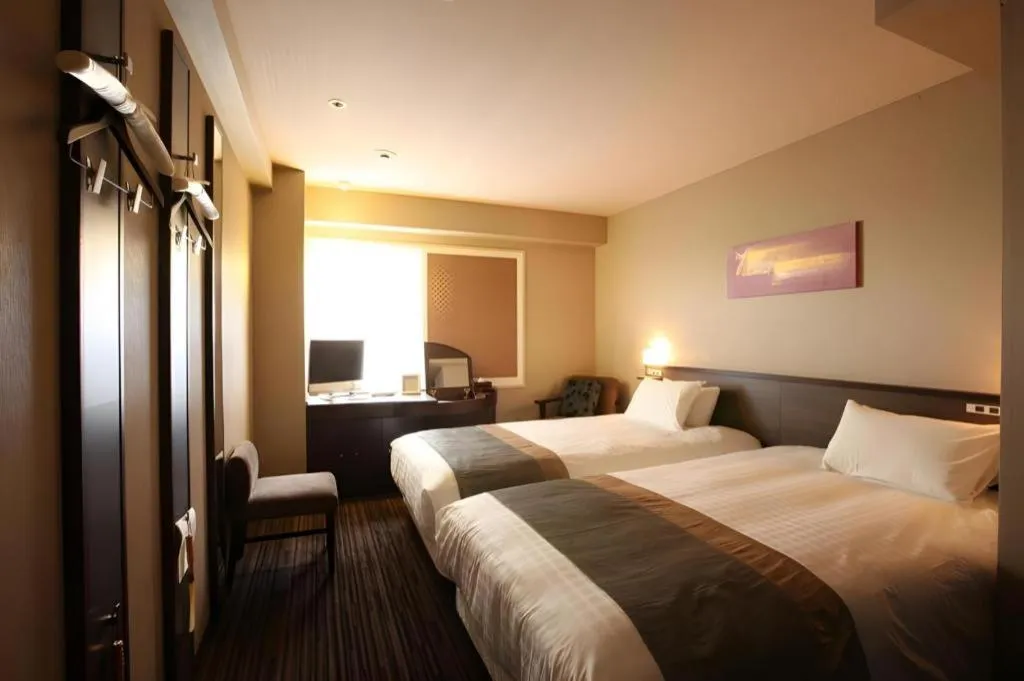 Bed in Ochanomizu Hotel Juraku