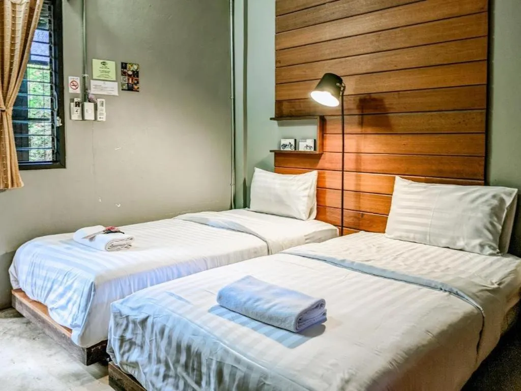 Bed in Huen Chang Puek Hotel