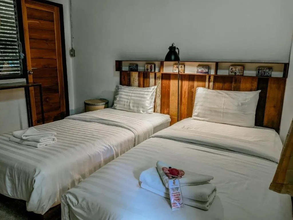 Bed in Huen Chang Puek Hotel