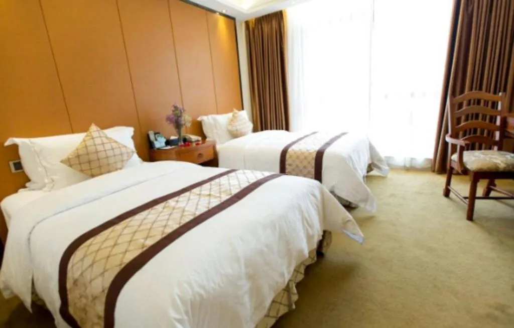 Bed in Auspicious Hotel