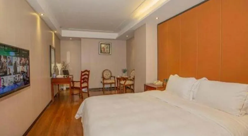 Bed in Auspicious Hotel