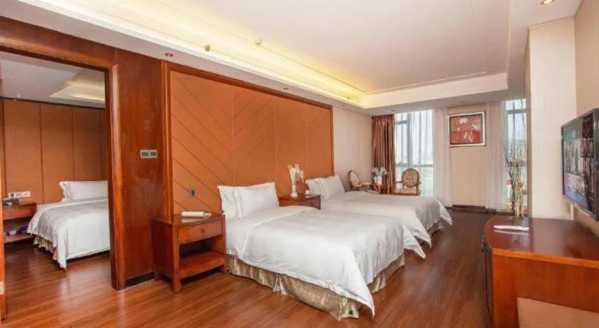 Bed in Auspicious Hotel