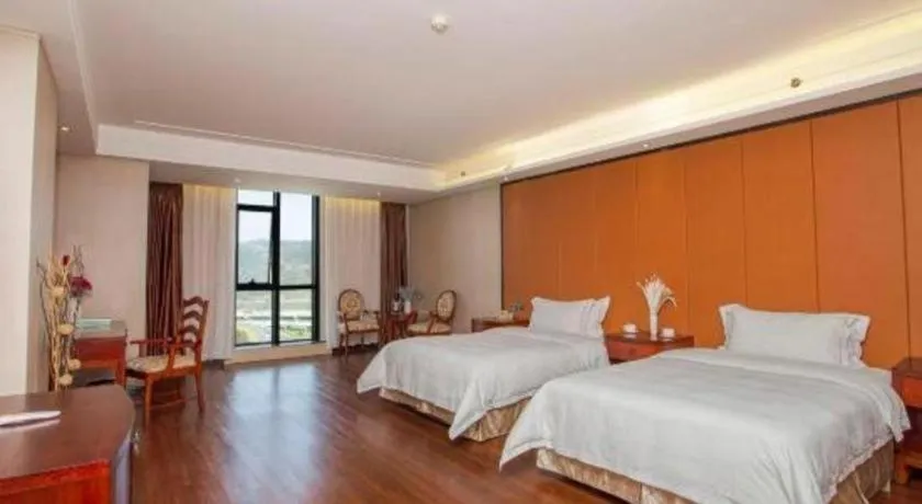 Bed in Auspicious Hotel