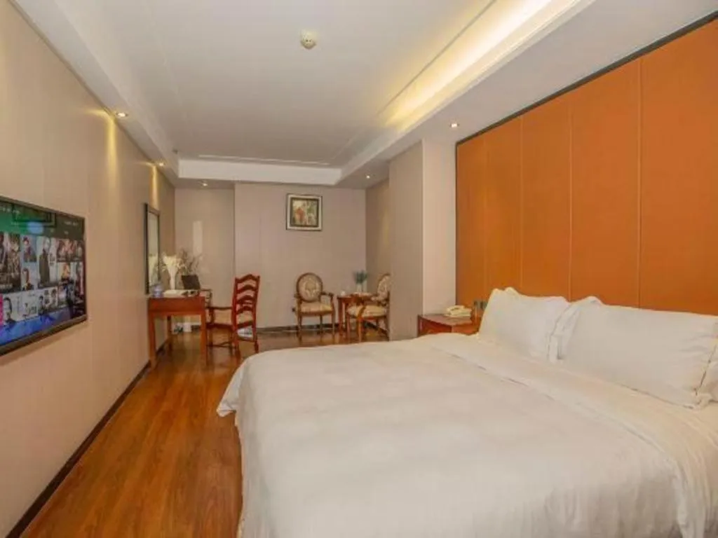 Bed in Auspicious Hotel