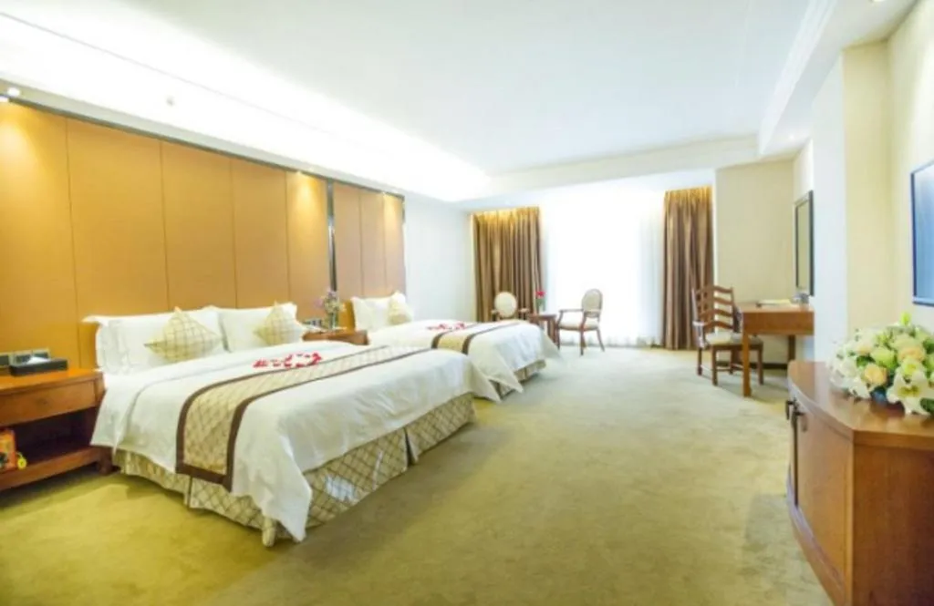 Bed in Auspicious Hotel