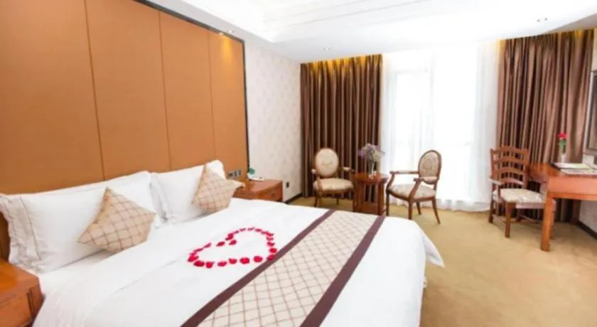 Bed in Auspicious Hotel