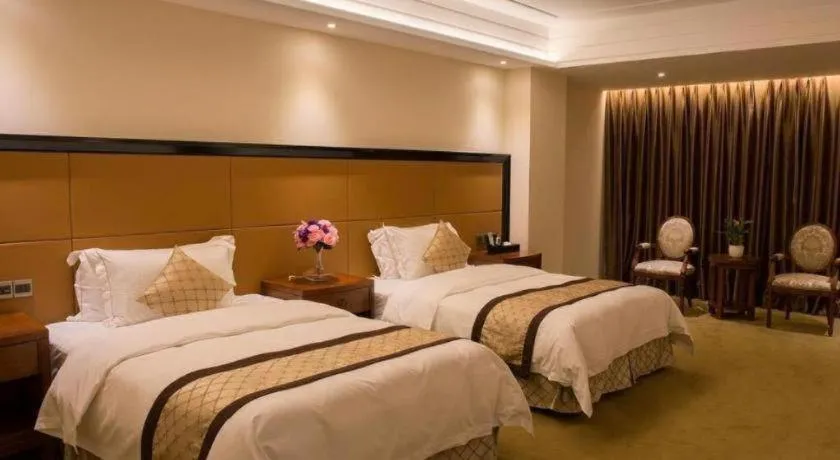 Bed in Auspicious Hotel