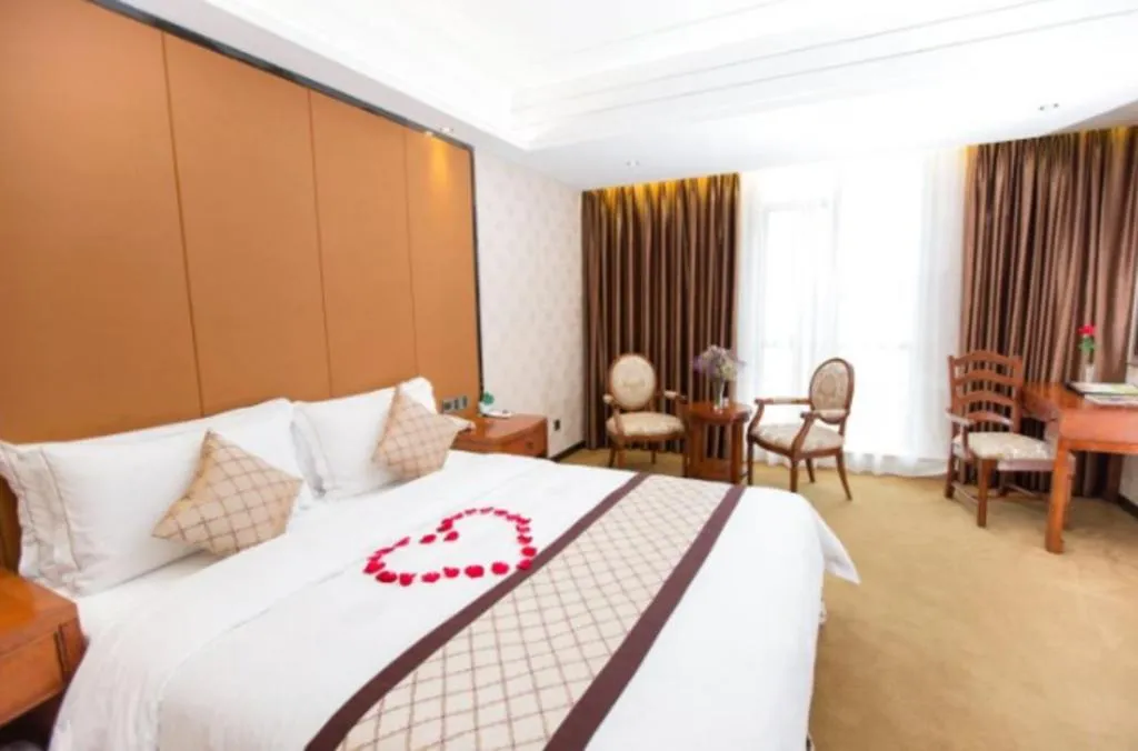 Bed in Auspicious Hotel