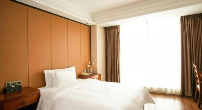 Bed in Auspicious Hotel