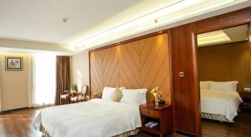 Bed in Auspicious Hotel