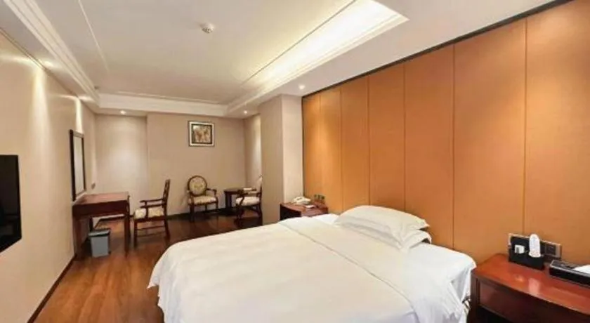 Bed in Auspicious Hotel