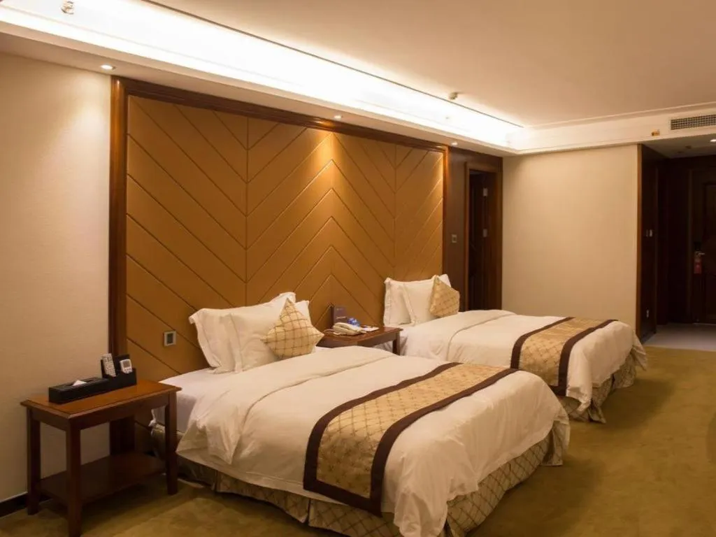 Bed in Auspicious Hotel