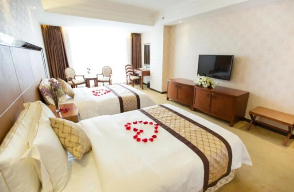 Bed in Auspicious Hotel