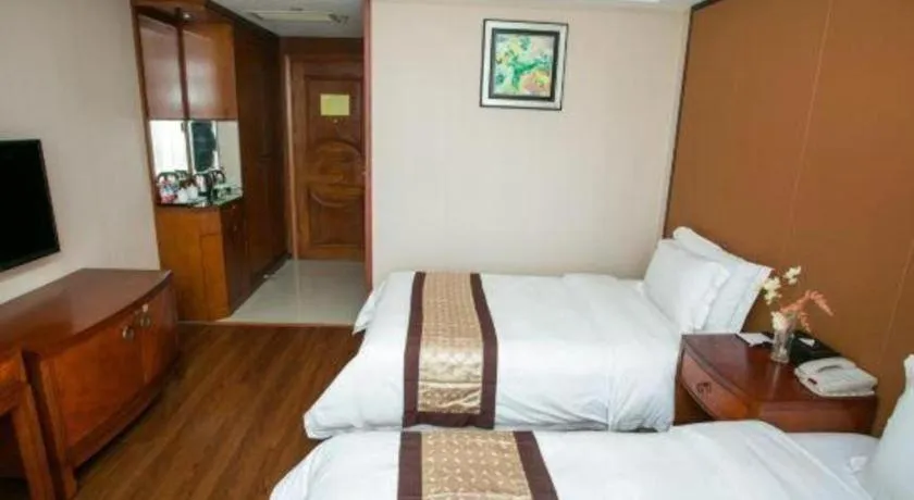 Bed in Auspicious Hotel