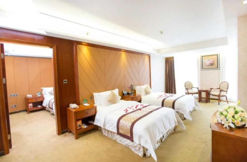 Bed in Auspicious Hotel