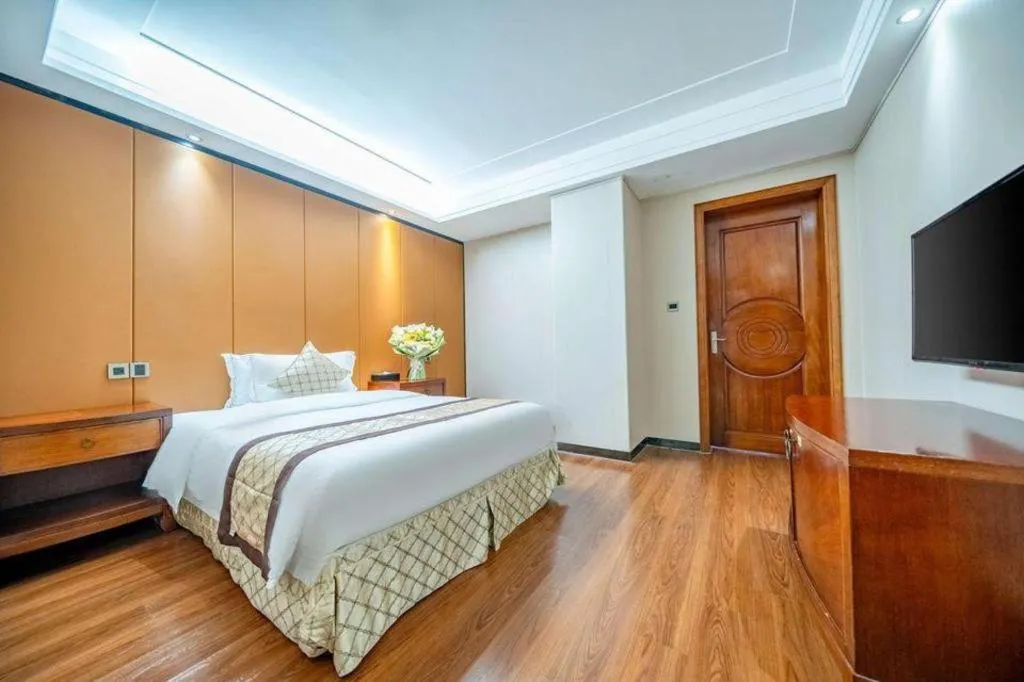 Bed in Auspicious Hotel