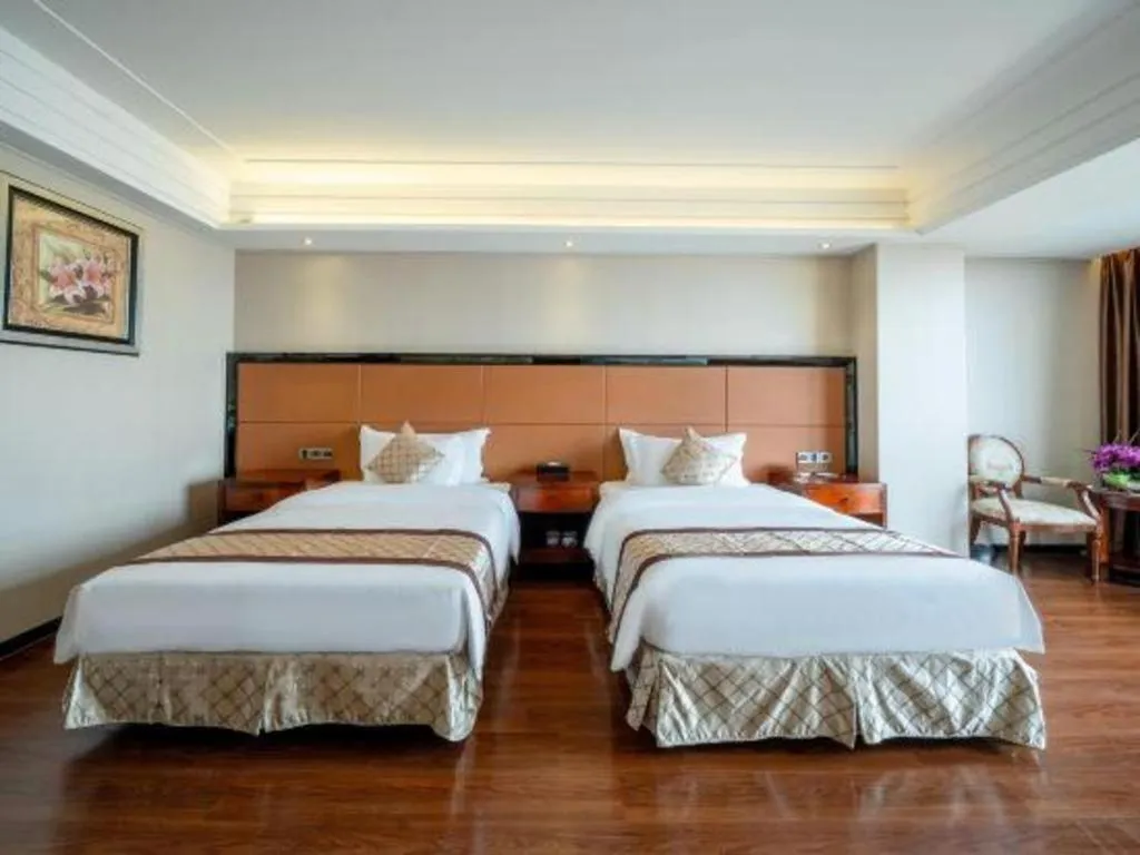 Bed in Auspicious Hotel