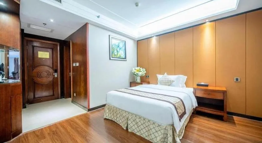 Bed in Auspicious Hotel