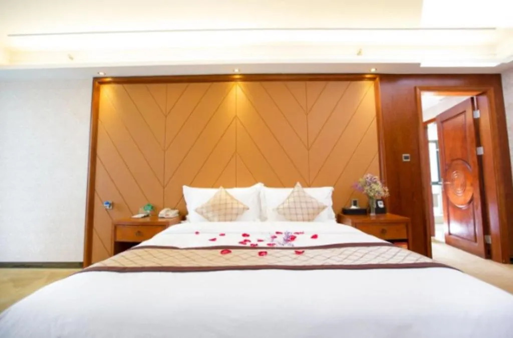Bed in Auspicious Hotel