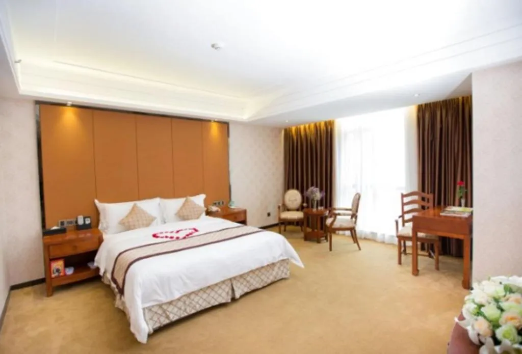 Bed in Auspicious Hotel