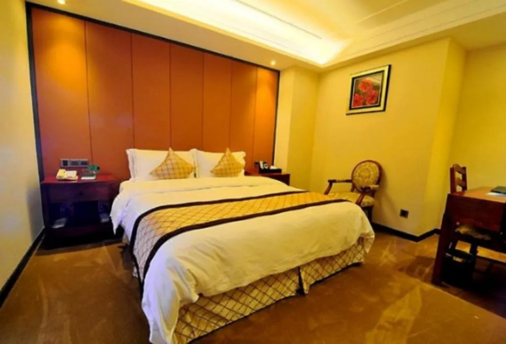 Bed in Auspicious Hotel