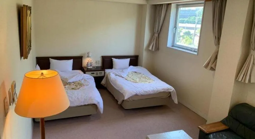 Bed in Tara Kanko Hotel