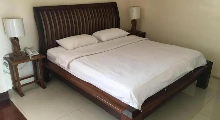 Bed in Mango Valley Hotel