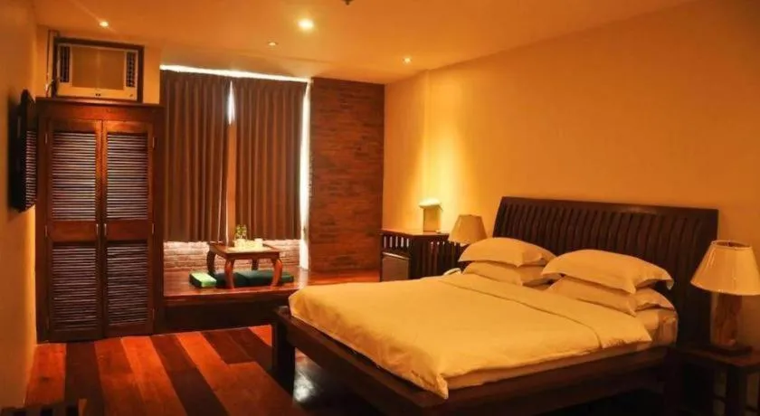 Bed in Mango Valley Hotel
