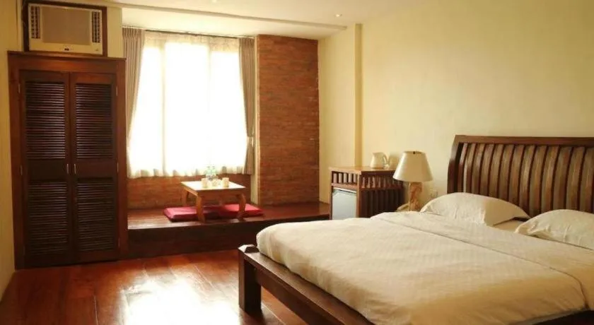 Bed in Mango Valley Hotel