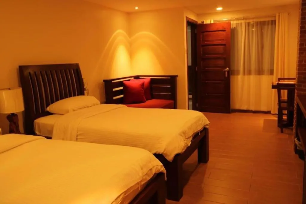 Bed in Mango Valley Hotel