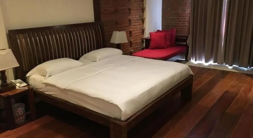 Bed in Mango Valley Hotel