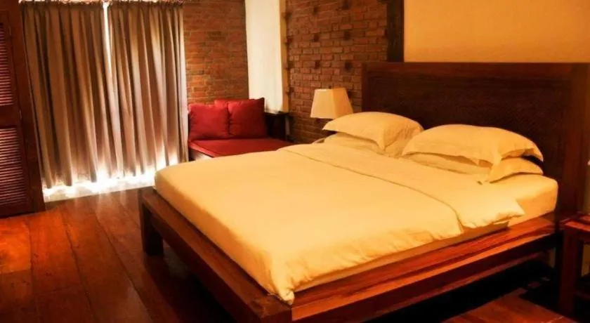 Bed in Mango Valley Hotel