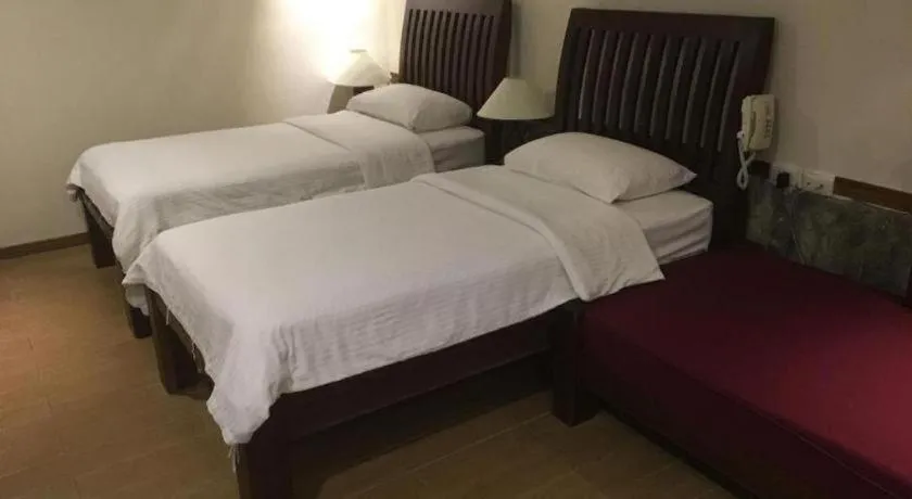 Bed in Mango Valley Hotel