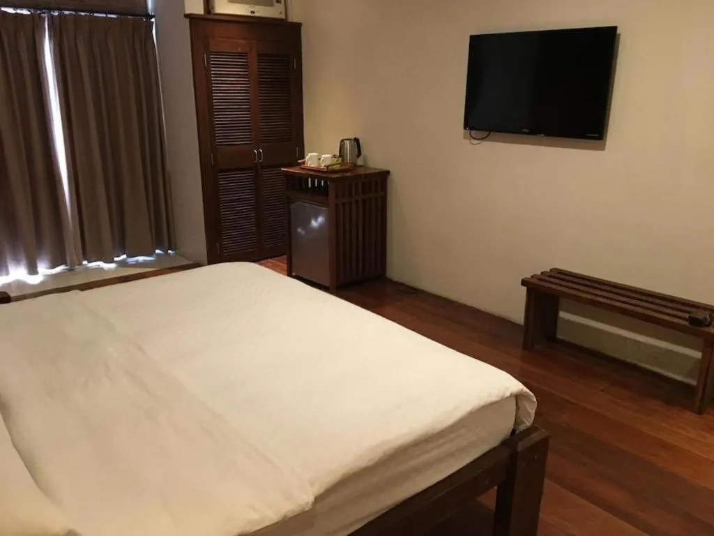 Bed in Mango Valley Hotel