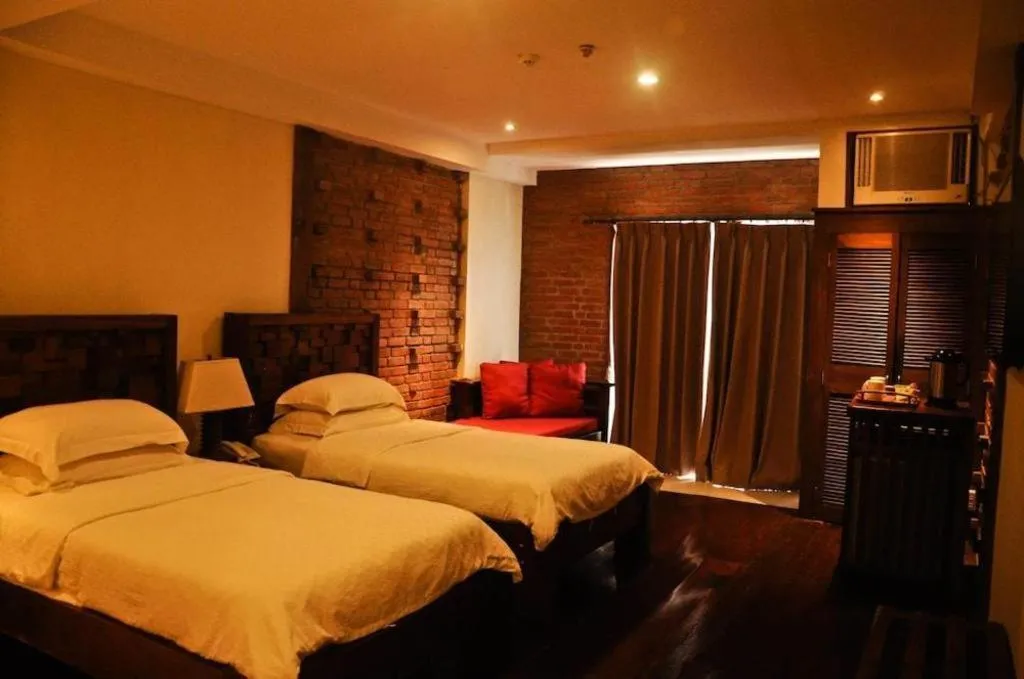 Bed in Mango Valley Hotel