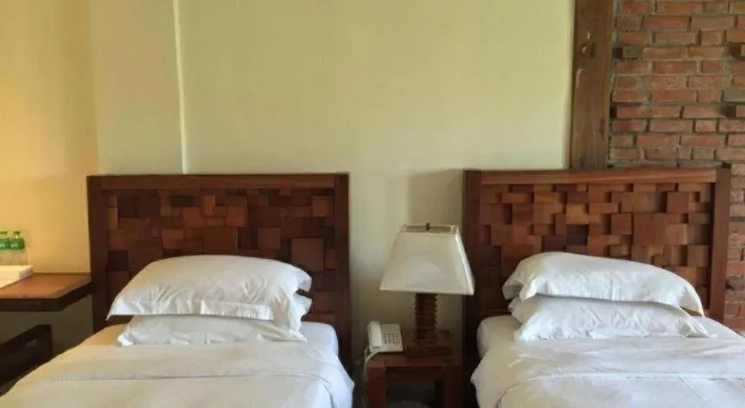 Bed in Mango Valley Hotel
