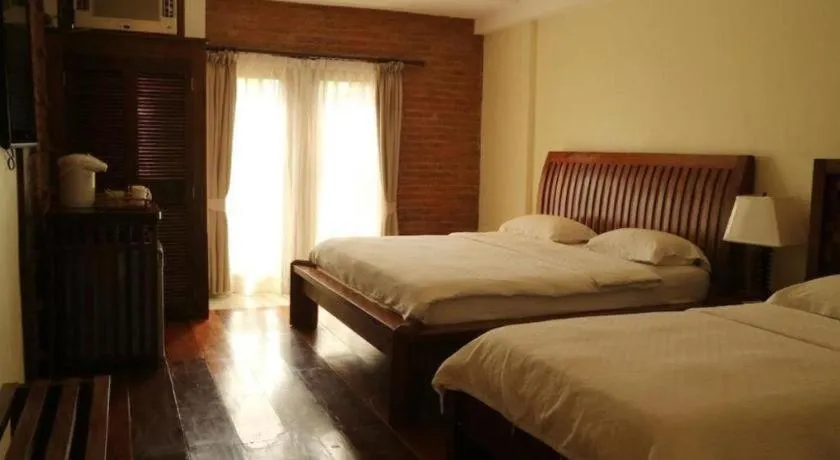 Bed in Mango Valley Hotel