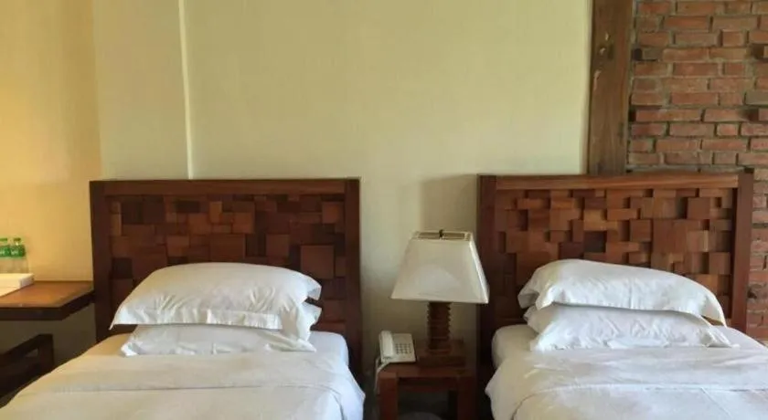 Bed in Mango Valley Hotel